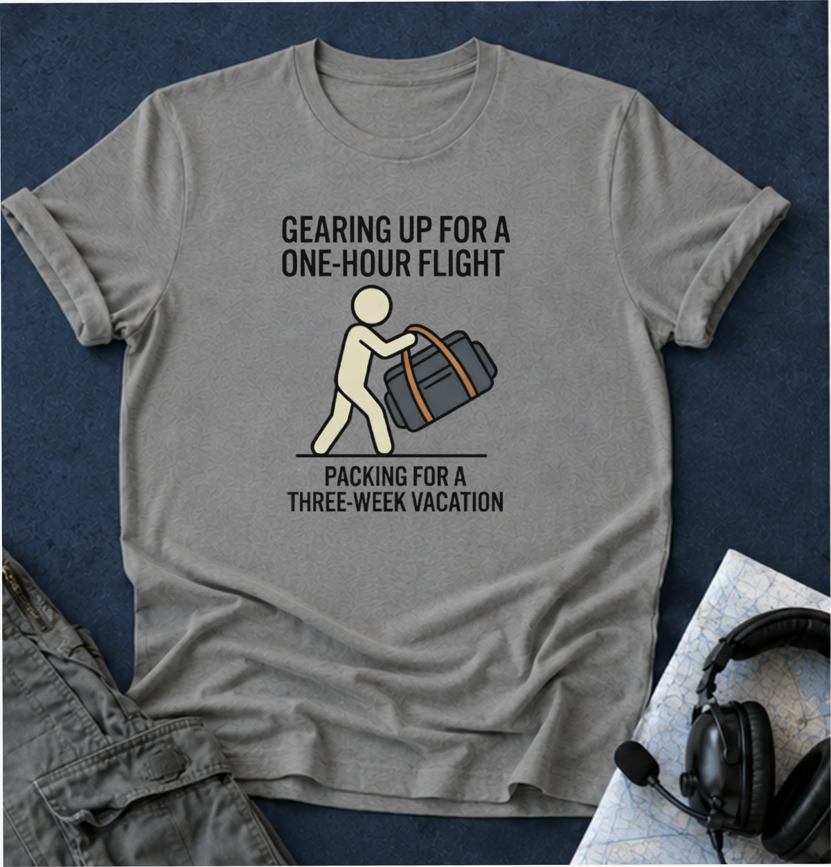 Packing Humor T-Shirt — "Gearing Up for a One-Hour Flight, Packing for a Three-Week Vacation"