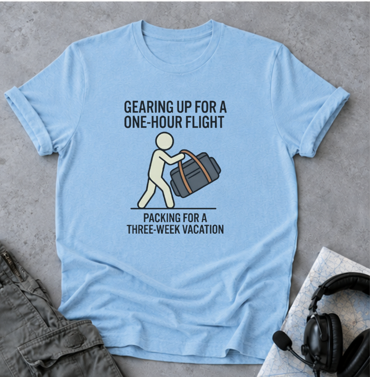 Packing Humor T-Shirt — "Gearing Up for a One-Hour Flight, Packing for a Three-Week Vacation"
