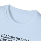Packing Humor T-Shirt — "Gearing Up for a One-Hour Flight, Packing for a Three-Week Vacation"